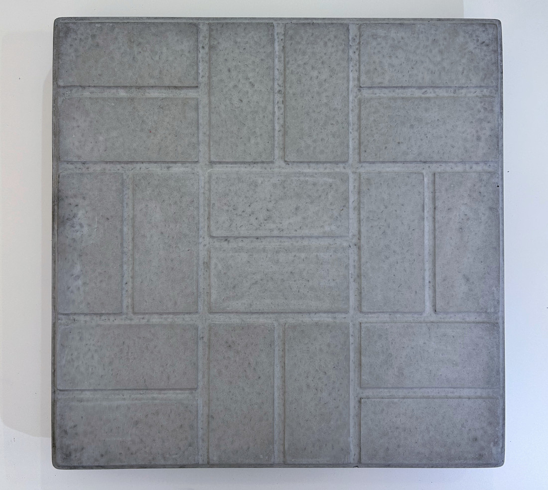Brick pattern precast concrete patio slab by Rocky Mountain Concrete