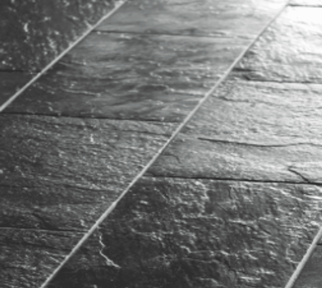 Charcoal slate texture precast concrete patio slab by Rocky Mountain Concrete
